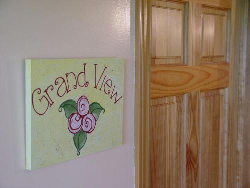 a painting on a wall with the words grand view at Our Valley View Bed & Breakfast in Hampton