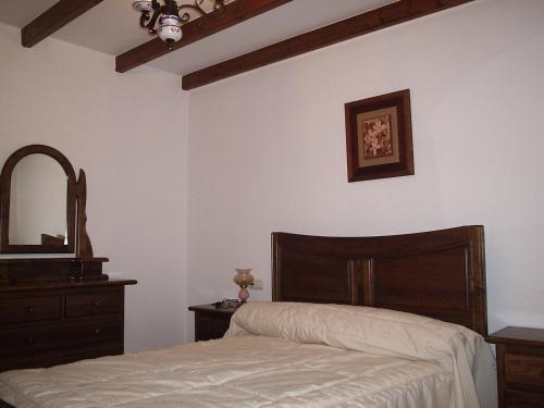 Postel nebo postele na pokoji v ubytování Casa Rural Arturo I