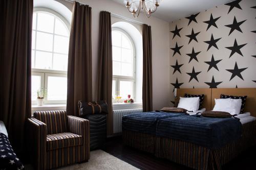 Кровать или кровати в номере Hotel Epoque & Apartments
