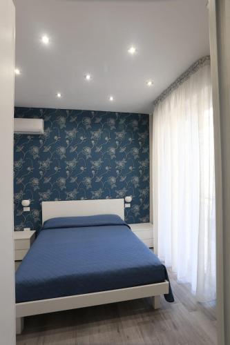 Postel nebo postele na pokoji v ubytování B&B MiMà