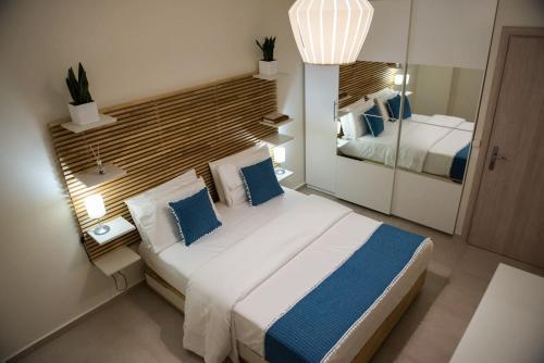 Voodi või voodid majutusasutuse Ammos Elegant Luxury Apartment toas