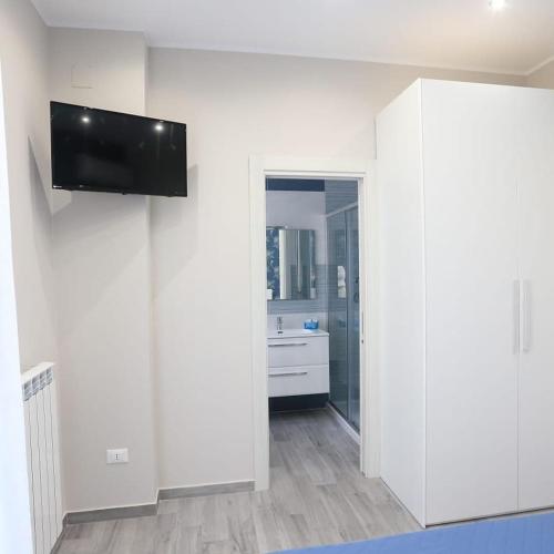 TV a/nebo společenská místnost v ubytování B&B MiMà