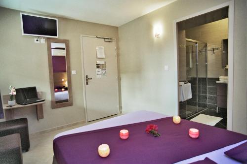 Koupelna v ubytování Hôtel l'Anvia