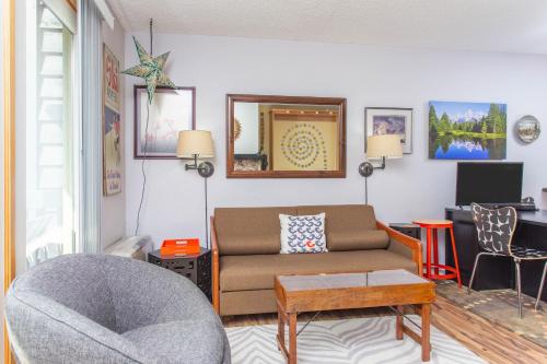 a living room with a couch and a chair at Brighton #107 - 1 Bath Studio Apartment in Alyeska in Girdwood