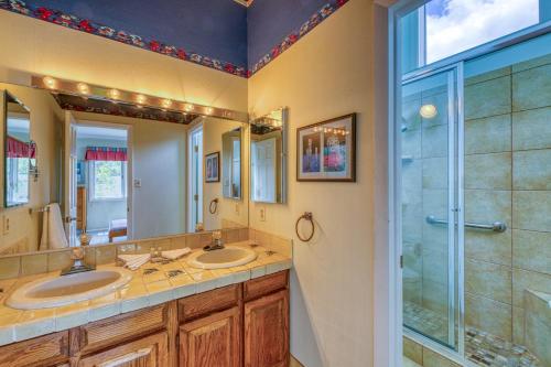 a bathroom with two sinks and a shower at Manns Ranch A - 4 Bed 4 Bath Vacation home in East Vail in Mid Vail