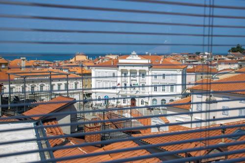 a view of a city from the roof of a building at Apartment Sebastijan in Piran
