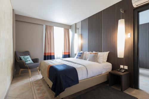 Ein Bett oder Betten in einem Zimmer der Unterkunft Best Western SeePark Hotel Murten