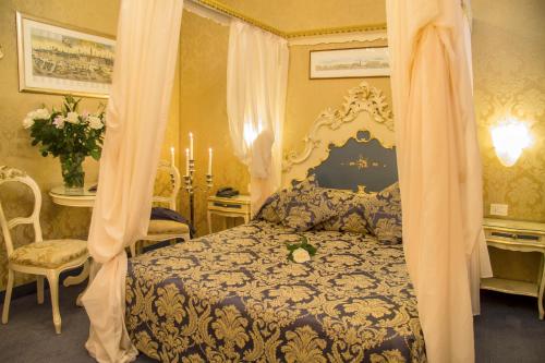 Postel nebo postele na pokoji v ubytování Hotel Becher