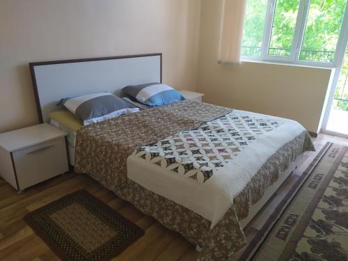 מיטה או מיטות בחדר ב-Boomerang Guest house
