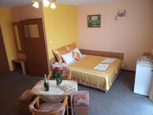 Postel nebo postele na pokoji v ubytování Willa ANNA