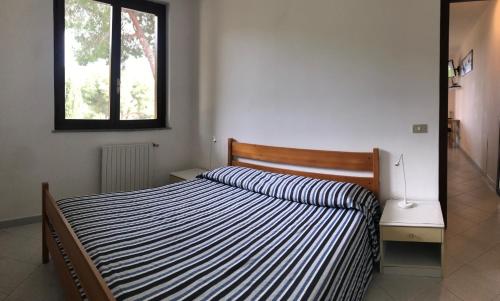 Villa Barabarca tesisinde bir odada yatak veya yataklar