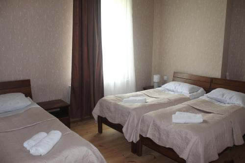 Кровать или кровати в номере Rustaveli st11