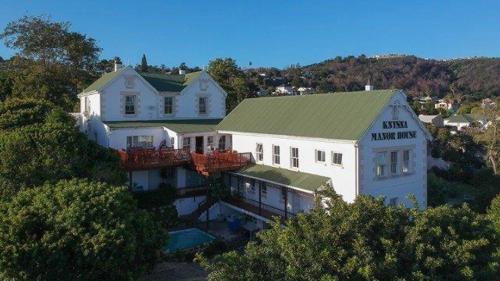 an aerial view of a large white house at Knysna Manor House in Knysna