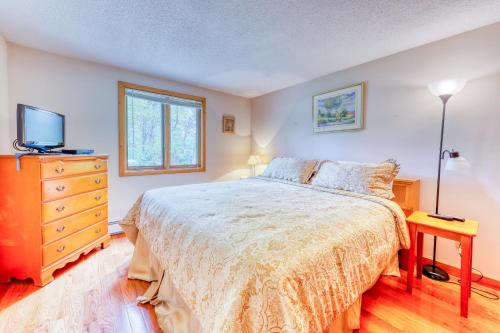Ein Bett oder Betten in einem Zimmer der Unterkunft 2D Village at North Conway