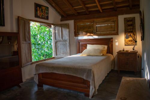 Postel nebo postele na pokoji v ubytování Casa El Cedro