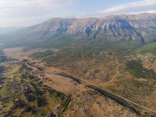an aerial view of a mountain with a road at Holiday home Marija in Vrlika