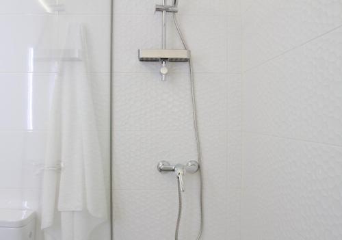 Ванная комната в Acio blanco. Loft en el Casco Histórico de Ourense