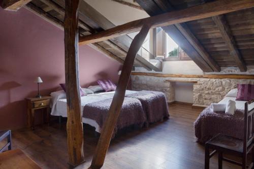Postel nebo postele na pokoji v ubytování Casa Rural Los Yeros Aldeasoña - Segovia