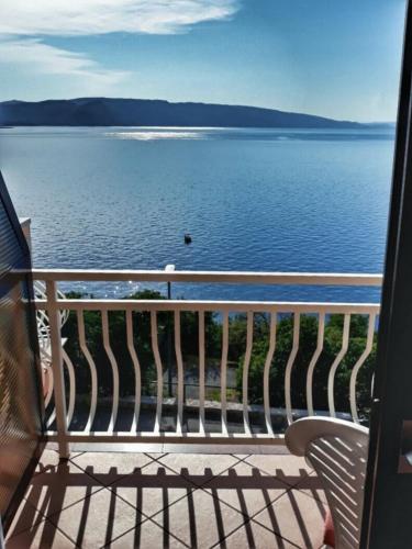 a view of the water from a balcony at Apartment Bellavita Senj in Senj