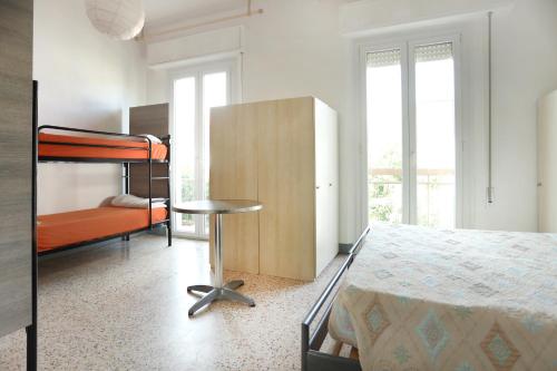 Postel nebo postele na pokoji v ubytování Jammin' Hostel & Bar Rimini
