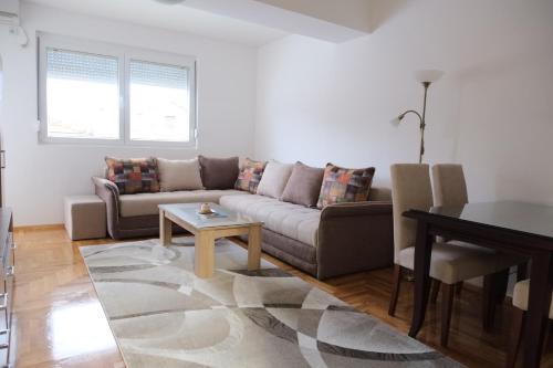 Posezení v ubytování Enjoy Apartments Karamach