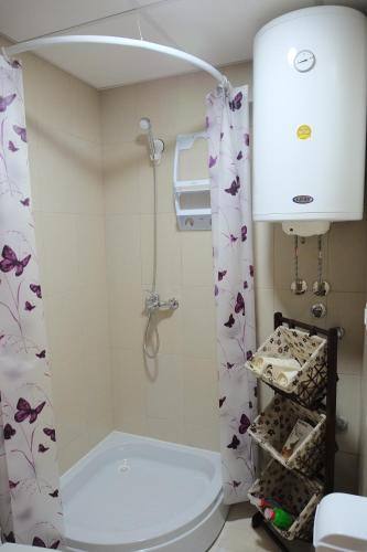A bathroom at Enjoy Apartments Karamach