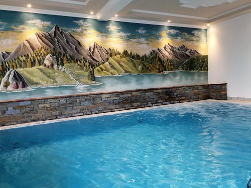 Bazén v ubytování Apart Hotel Ideal nebo v jeho okolí