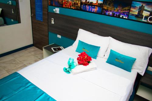 Postel nebo postele na pokoji v ubytování SUITES FullHouse