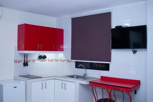 Kuchyň nebo kuchyňský kout v ubytování SUITES FullHouse