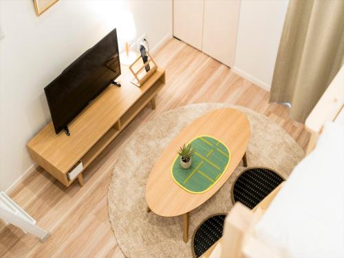 TV a/nebo společenská místnost v ubytování TRIP POD KOMONDO-MACHI