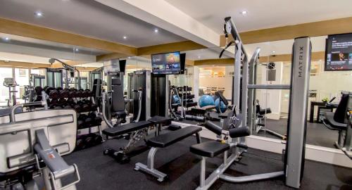 a gym with treadmills and machines in a building at BYD Lofts - Boutique Hotel & Serviced Apartments - Patong Beach, Phuket in Patong Beach