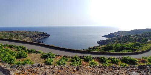 an aerial view of the ocean and a river at TramontanaBeach in Tracino
