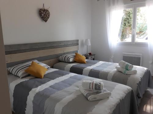 Ένα ή περισσότερα κρεβάτια σε δωμάτιο στο Galinette