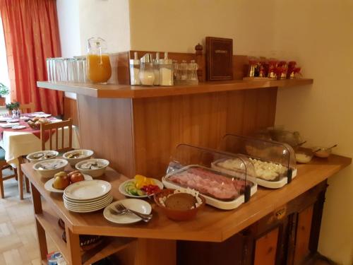 a table with a buffet of food on it at Haus Rohskopf in Mallnitz