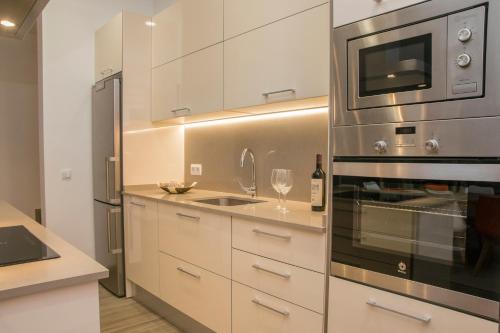 Dapur atau dapur kecil di Villa Bella