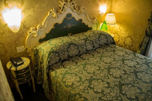 Postel nebo postele na pokoji v ubytování Hotel Becher