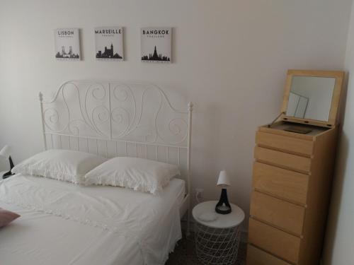 Кровать или кровати в номере Domus Marina