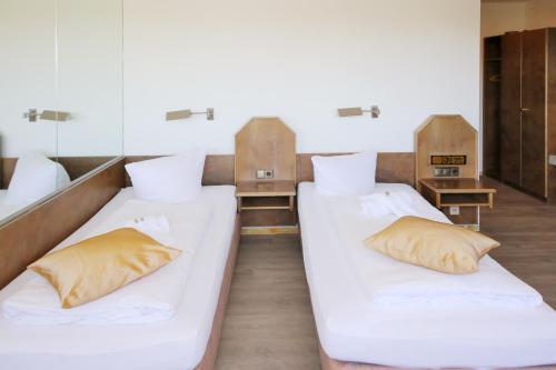 Postel nebo postele na pokoji v ubytování Hotel Kick