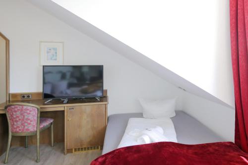 TV a/nebo společenská místnost v ubytování Hotel Kick