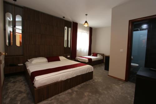 Postel nebo postele na pokoji v ubytování Prior Hotel