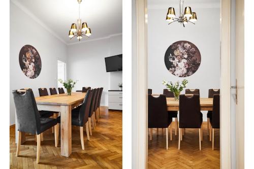 jadalnia i kuchnia ze stołem i krzesłami w obiekcie Unique apartments Krasinskiego street w Krakowie