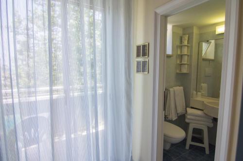 Koupelna v ubytování Hotel Solidea
