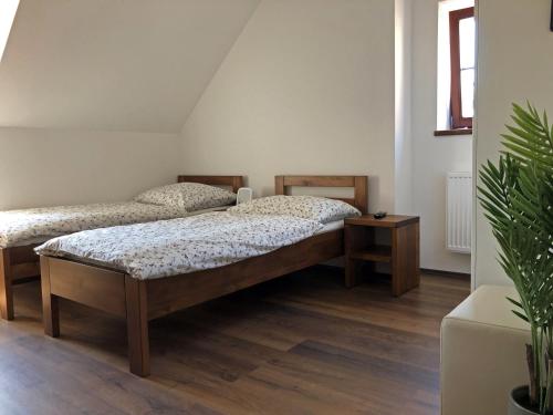 Postel nebo postele na pokoji v ubytování U Matyase