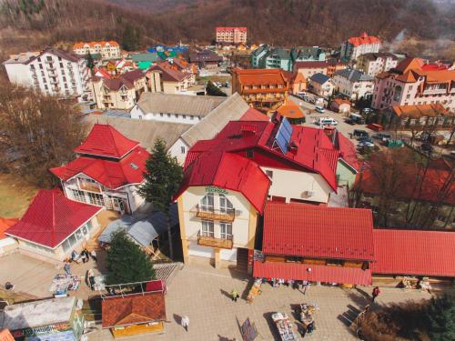 an aerial view of a town with red roofs at Kvasova Voda in Polyana