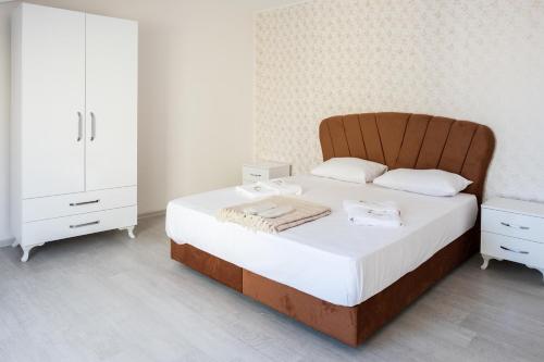 En eller flere senger på et rom på Araz Suit Otel