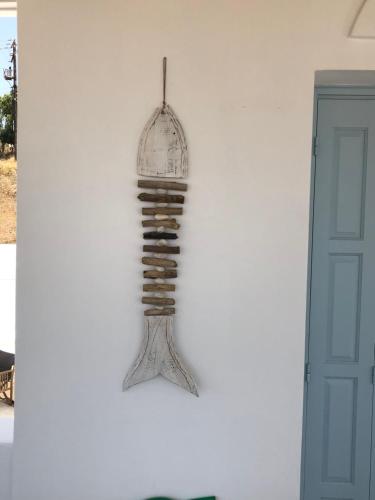 a decoration on the side of a wall at Harmony Luxury Villas Naxos in Naxos Chora