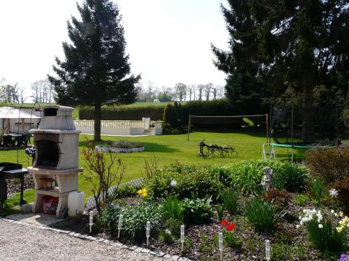 a garden with two horses and a goal at Chambres d'hôte du Domaine de la Reine Blanche in Criquetot-sur-Longueville