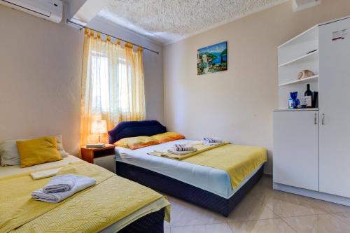 Voodi või voodid majutusasutuse Apartments Radojević toas