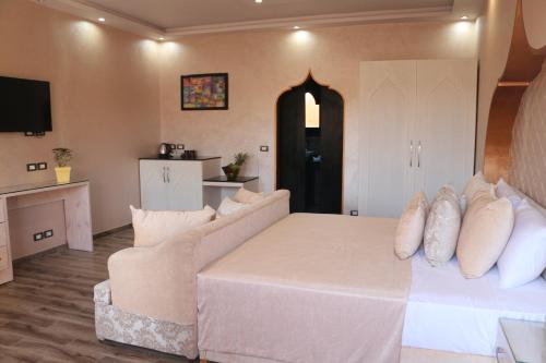 מיטה או מיטות בחדר ב-Casa d'Or Dahab PALAZZO