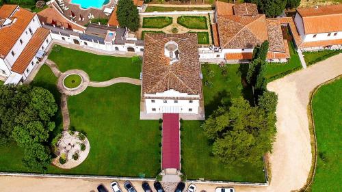an overhead view of a house with a large roof at Villa Tolomei Hotel & Resort in Florence